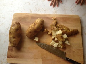 Potatoes. Make sure any little hands are out of the way!