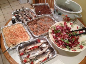 The rest of the spread: branzino roasted w/tomatoes & olives, homemade potato salad, chicken & rice smothered in mushroom white wine sauce, radicchio salad, collard greens.